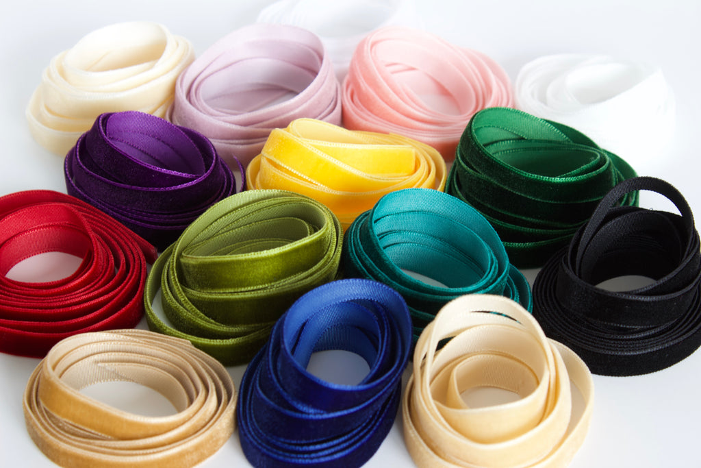 Assorted colorful velvet ribbons on a white background sold by Kikiwi