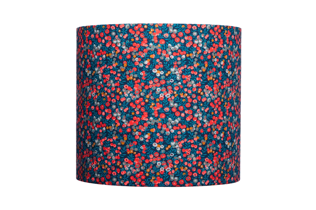 Detailed view of the Liberty Wiltshire iconic British charm, a playful berry-inspired print with fringe color options.