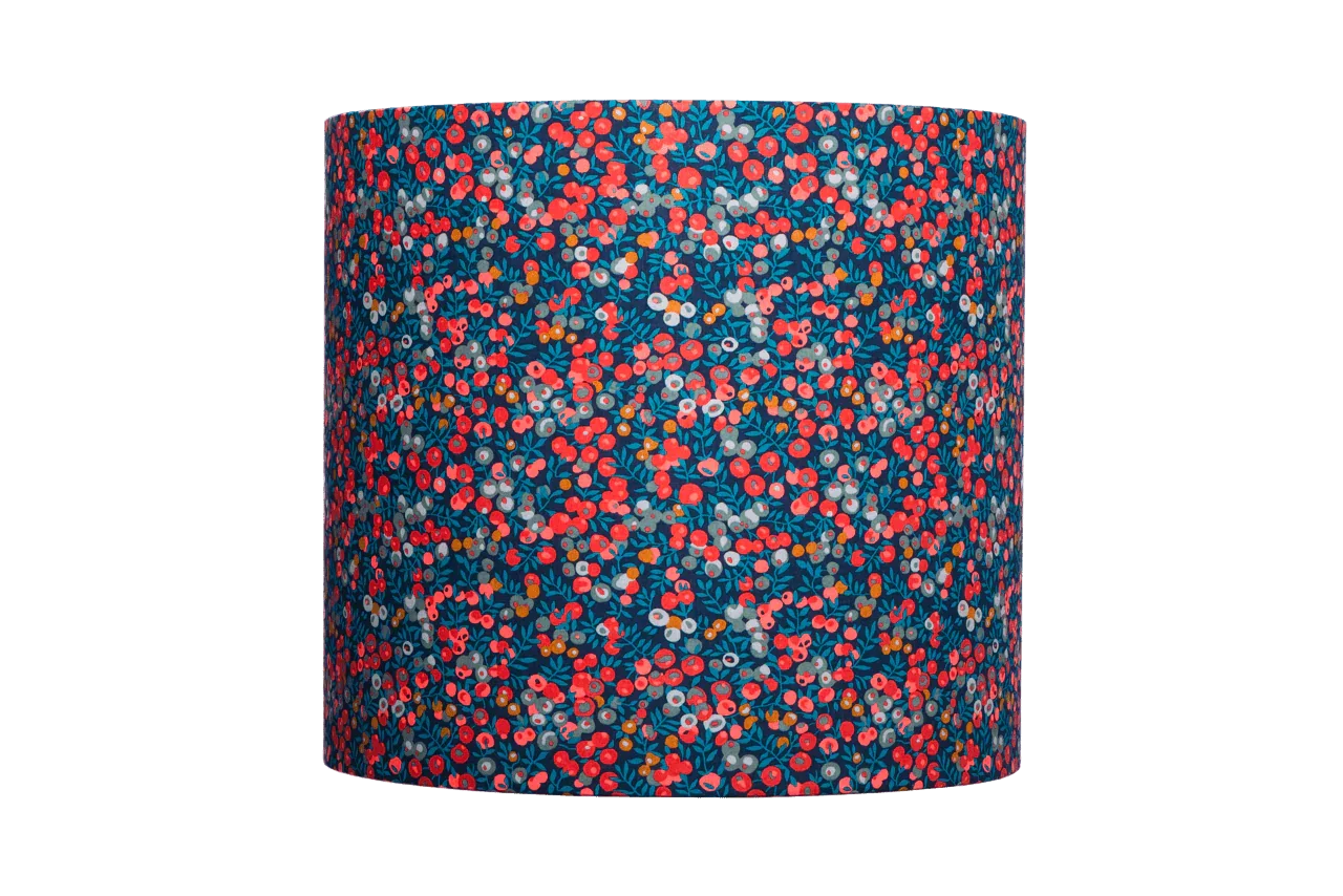 Detailed view of the Liberty Wiltshire iconic British charm, a playful berry-inspired print with fringe color options.